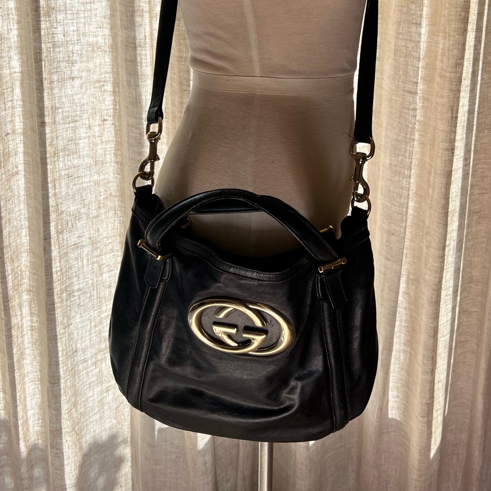 Authentic Gucci purse color, black with gold hardware - Picture 2 of 12